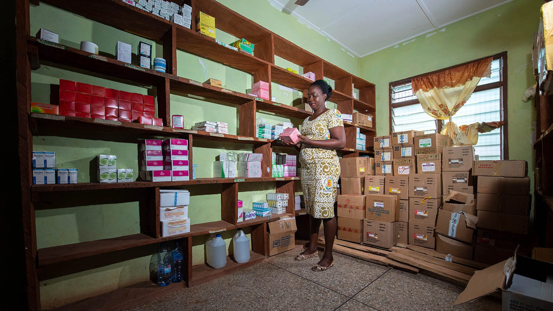 woman stocking local clinic